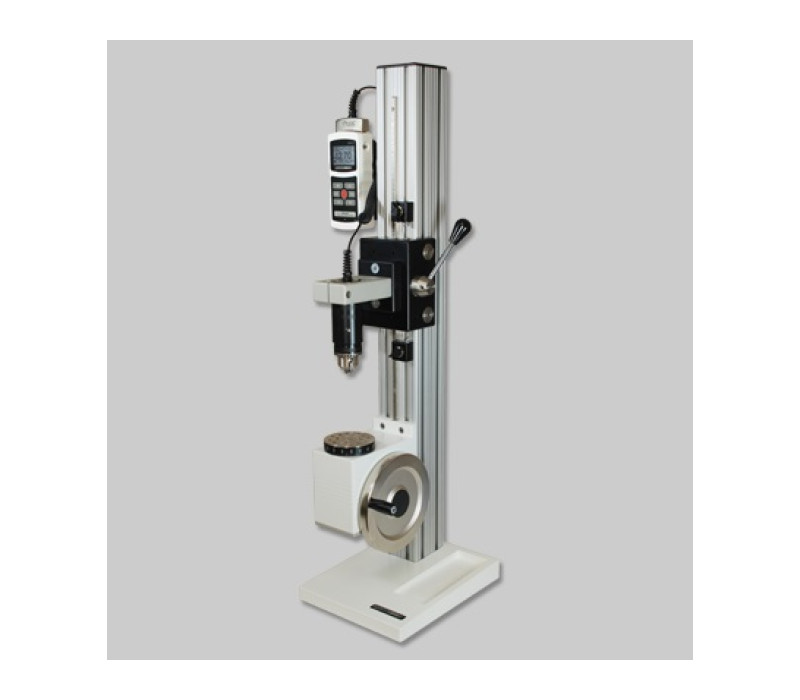 El banco de pruebas de par manual vertical TST se muestra con un indicador de fuerza/par modelo 5I y un sensor de par de la serie R50.