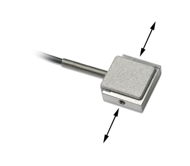La fuerza se aplica a estas superficies. Se suministran orificios roscados en ambos lados para acomodar accesorios y configuraciones de montaje.