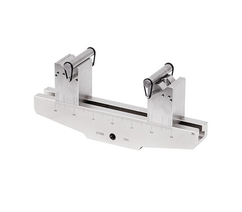 La base del dispositivo de flexión G1095 dispone de bloques móviles con rodillos de 10 mm de diámetro. Admite fuerzas de hasta 2,5 kN.