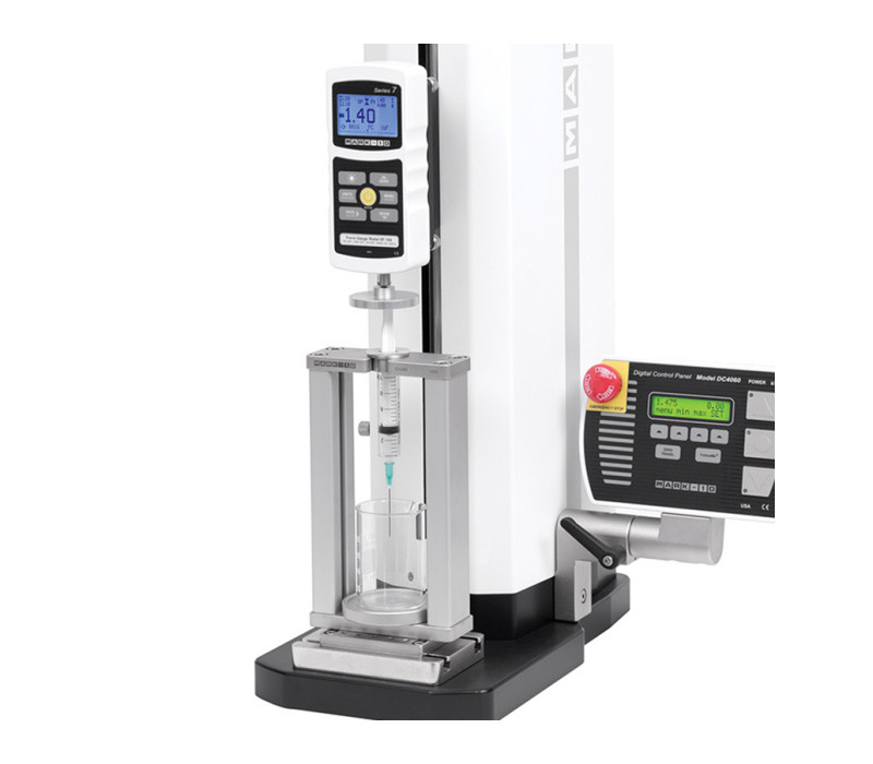 El G1089 se muestra en una utilización típica montado en un banco de pruebas motorizado con un adaptador de extremo de ojo opcional. La copa no está incluida.